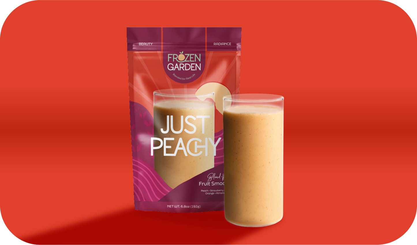 Just Peachy smoothie pouch beside blended glass - Frozen Garden ready to blend smoothie with peach and strawberry.