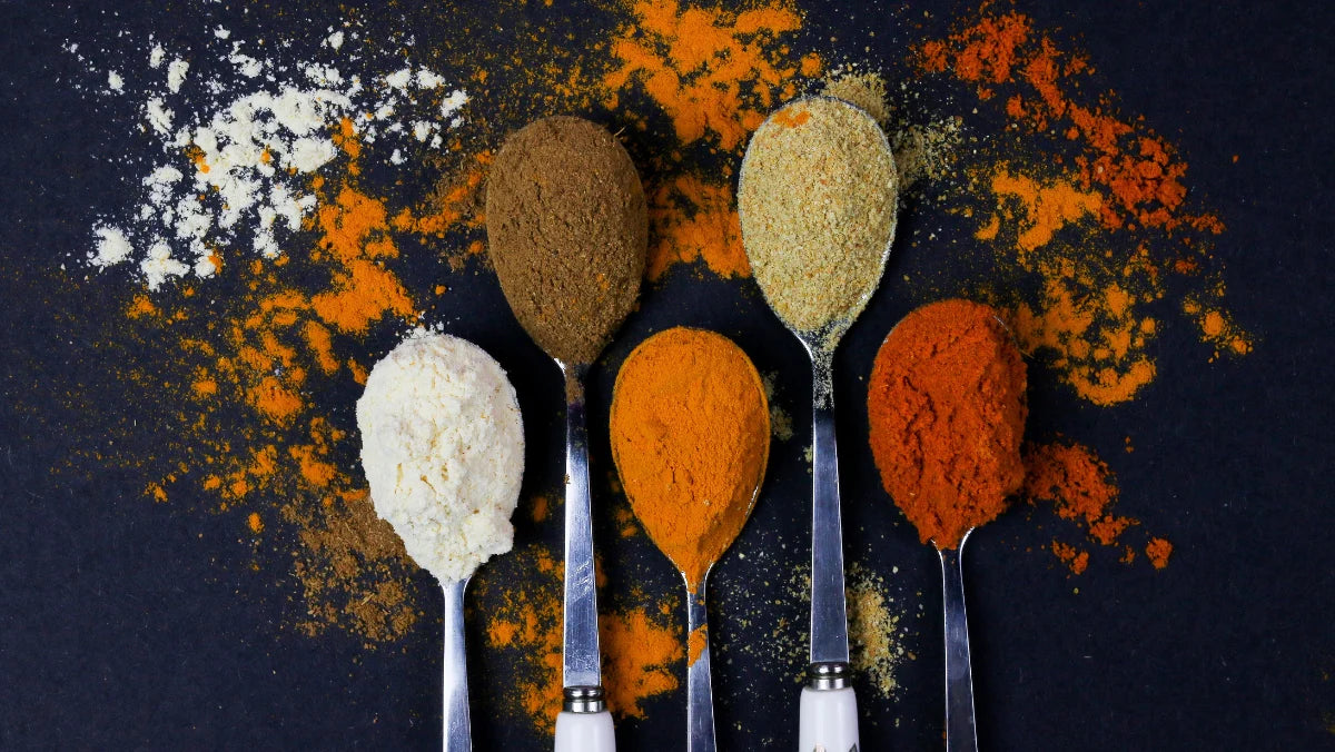 spices on spoons - benefits of turmeric, benefits of cinnamon, benefits of spices