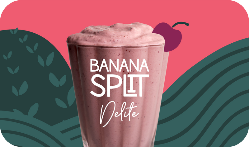 Banana Split Delite served in glass, creamy pink color with cherry design - Frozen Garden healthy frozen dessert.
