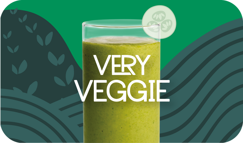 Blended Very Veggie smoothie in glass, creamy green color with cucumber design - Frozen Garden healthy keto smoothie.