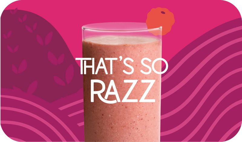 Blended That’s So Razz smoothie in glass, bright magenta color with raspberry design - Frozen Garden healthy berry smoothie.