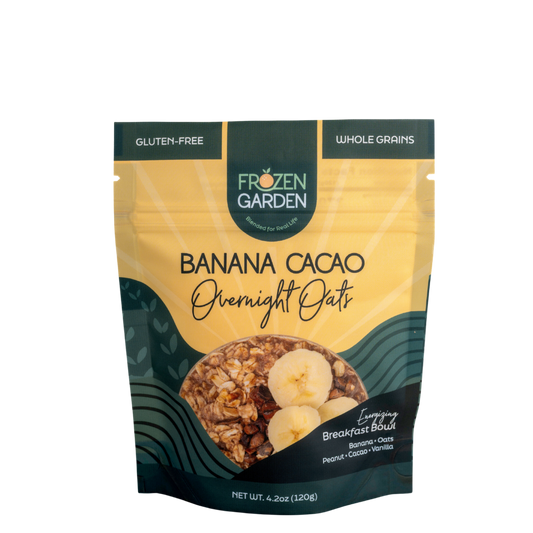Banana Cacao Overnight Oats pouch on white background with banana, cacao and oats - Frozen Garden plant-based breakfast.