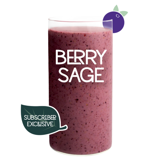 Blended Berry Sage smoothie in glass on clear background - Frozen Garden sage and blueberry smoothie.