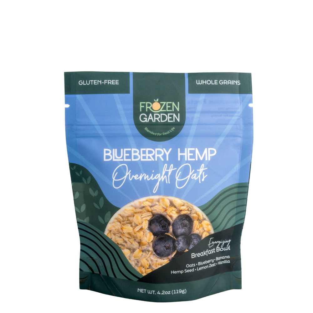 Blueberry Hemp Overnight Oats pouch on white background with blueberries, oats and hemp seeds - Frozen Garden plant-based breakfast.