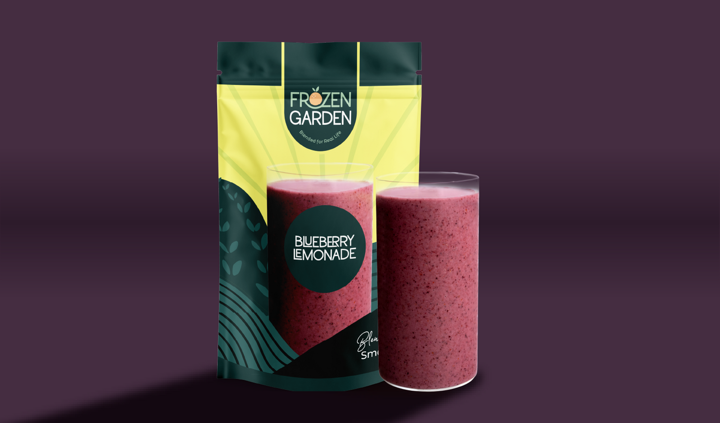 Blueberry Lemonade smoothie pouch beside blended glass - Frozen Garden ready to blend smoothie with blueberries and lemon.