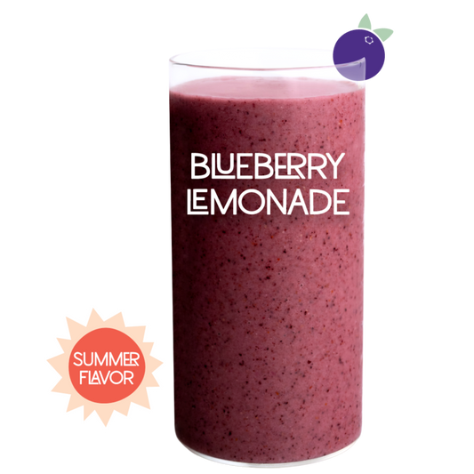 Blended Blueberry Lemonade smoothie in glass on white background - Frozen Garden blueberry and lemon smoothie.