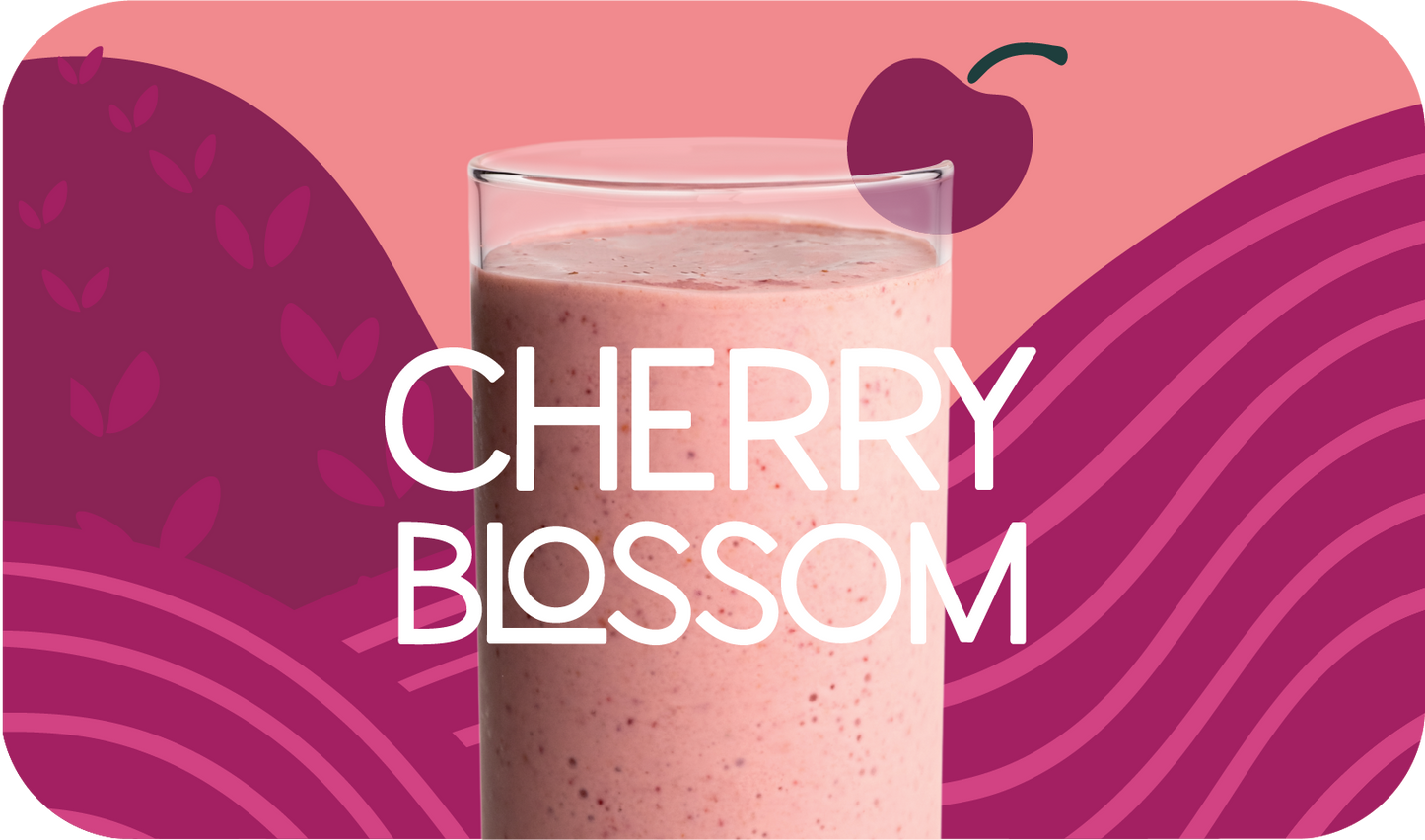 Blended Cherry Blossom smoothie in glass, soft pink color with cherry and citrus design - Frozen Garden healthy fruit smoothie.