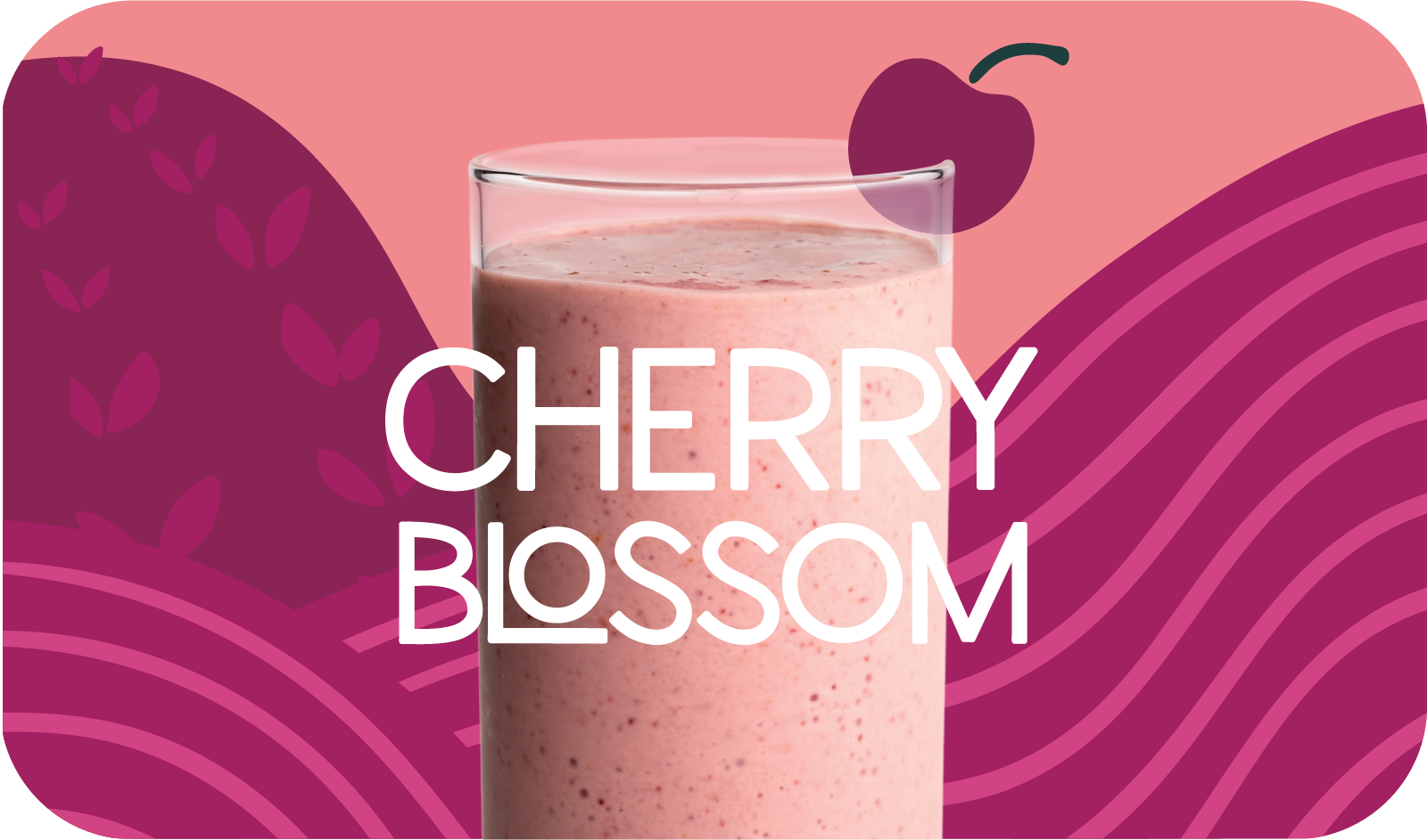 Blended Cherry Blossom smoothie in glass, soft pink color with cherry and citrus design - Frozen Garden healthy fruit smoothie.