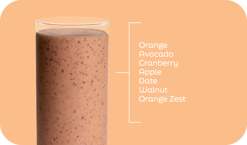 Cran-Orange cranberry smoothie ingredients labeled in layers: orange, cranberry, apple, date, avocado and walnut - Frozen Garden.
