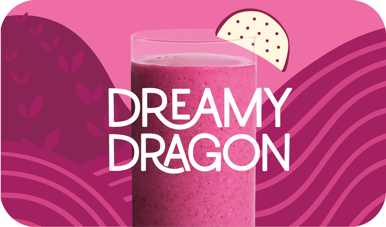 Blended Dreamy Dragon smoothie in glass, vibrant pink color with dragon fruit design - Frozen Garden healthy tropical smoothie.