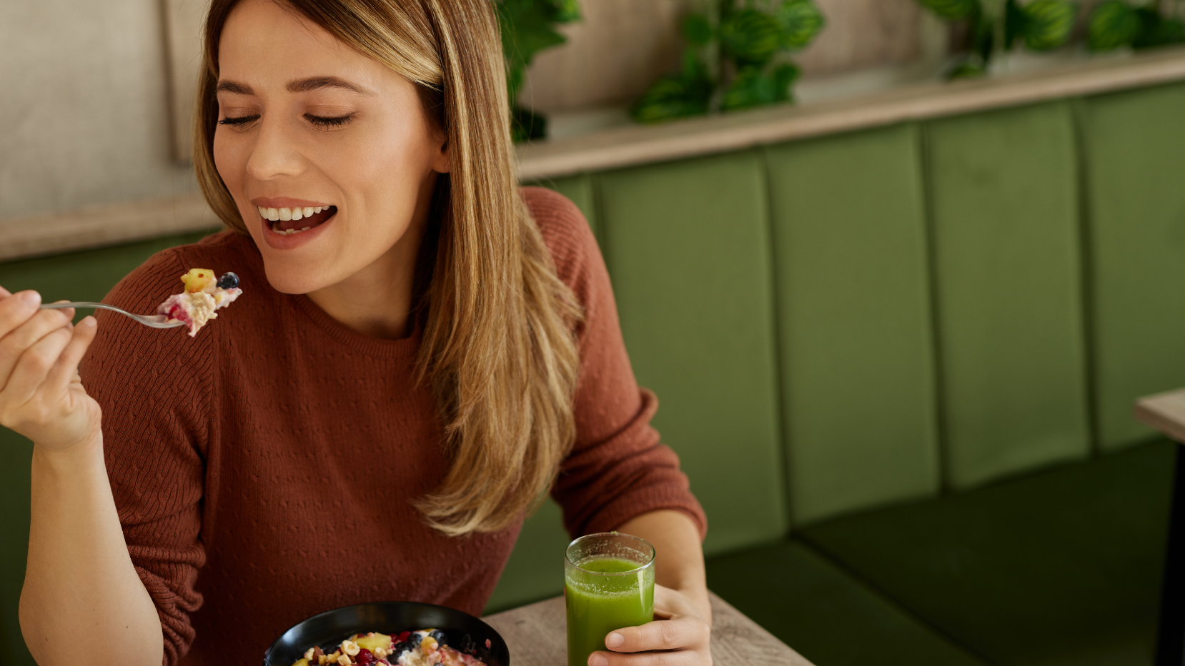 Woman eating overnight oats and a ready to blend smoothie.