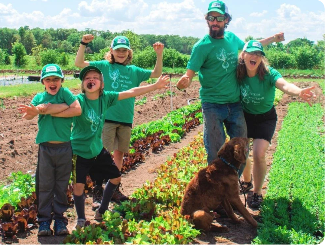 Perkins Good Earth Farm family cheering about Frozen Garden's frozen smoothie packs