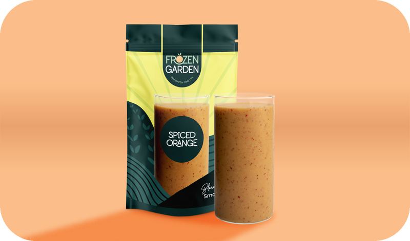 Spiced Orange smoothie pouch beside blended glass - Frozen Garden ready to blend smoothie with orange and ginger.