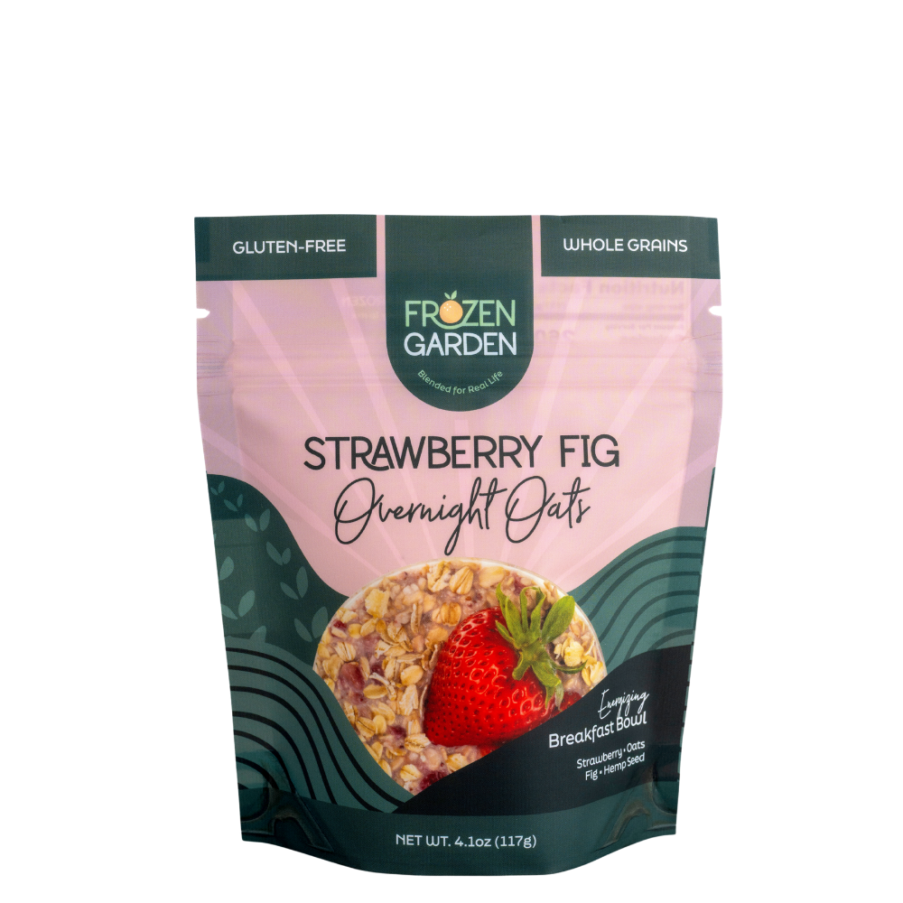 Strawberry Fig Overnight Oats pouch on white background with strawberries, figs and oats - Frozen Garden plant-based breakfast.