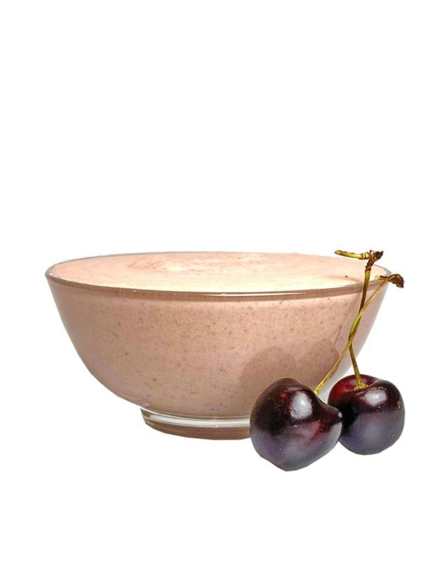 Cherry Cheesecake Delite blended in clear bowl, cheesecake smoothie ready to eat - Frozen Garden.
